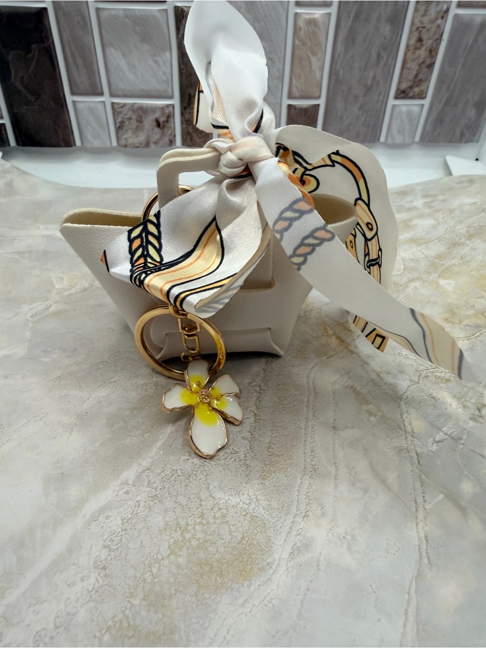 Women's Cream Handbag keychain with Floral Charm and Scarf Accent